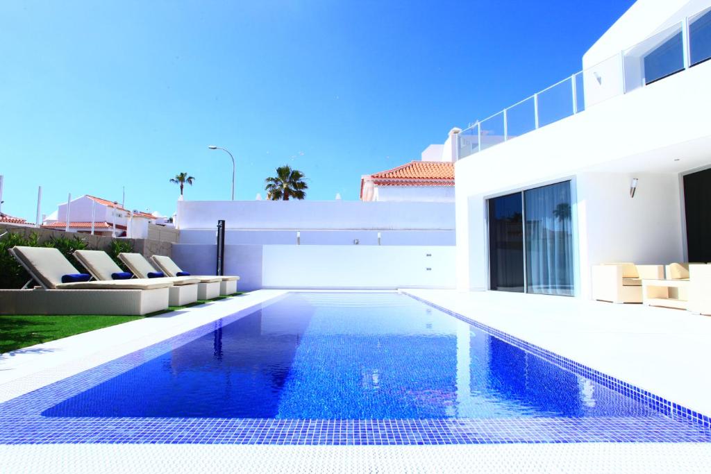 Bazén v ubytování Villas Flamingo Resort nebo v jeho okolí