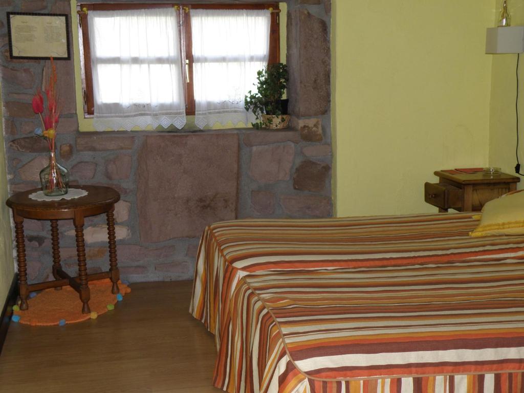 Postel nebo postele na pokoji v ubytování Posada Elbete