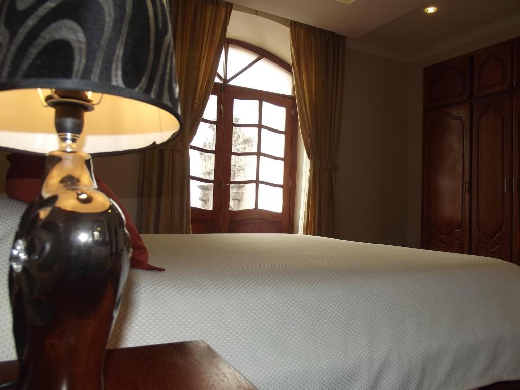 Postel nebo postele na pokoji v ubytování Hotel Casa Montero