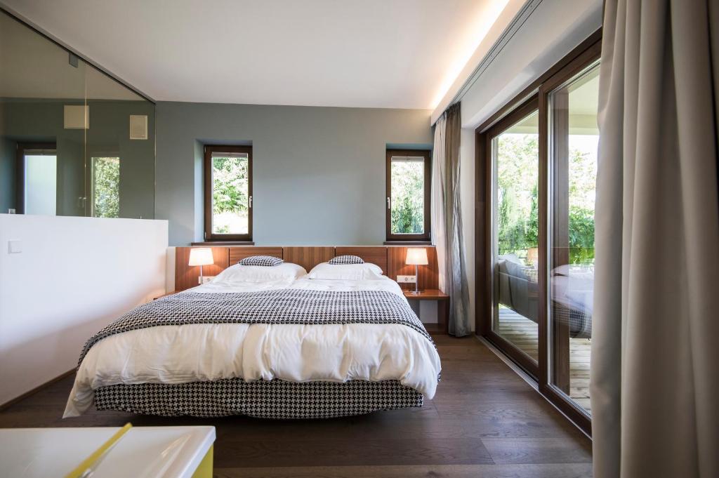 Postel nebo postele na pokoji v ubytování Designhotel Gius La Residenza
