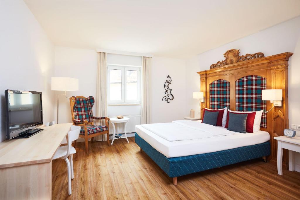 TV a/nebo společenská místnost v ubytování Hotel Prinzregent München Messe