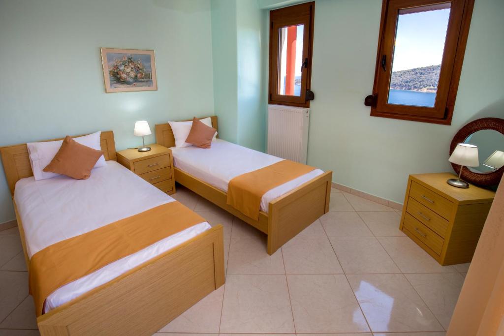 Voodi või voodid majutusasutuse Aphrodite Villas toas
