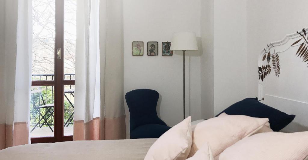 Postel nebo postele na pokoji v ubytování Castagna Amara
