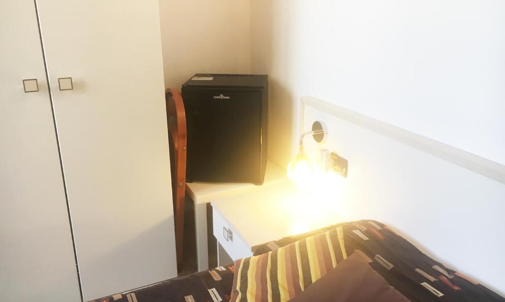 Łóżko lub łóżka w pokoju w obiekcie B&B Villa Giglio