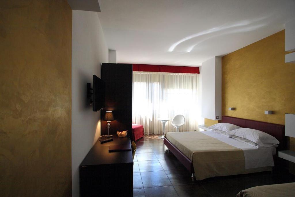 Postel nebo postele na pokoji v ubytování B&B Imbriani 24