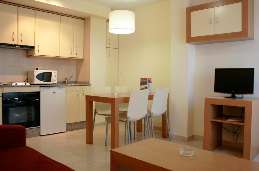 Kuchyň nebo kuchyňský kout v ubytování Aparthotel Milord's Suites