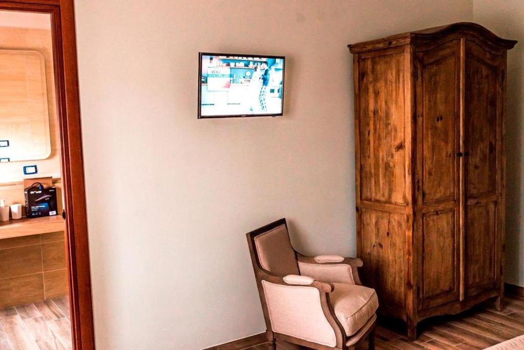 TV a/nebo společenská místnost v ubytování INFORMIS B&B