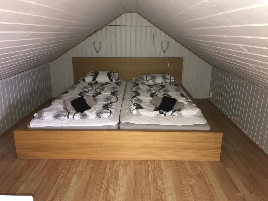 Postel nebo postele na pokoji v ubytování Hallandsgården by Mellbystrands