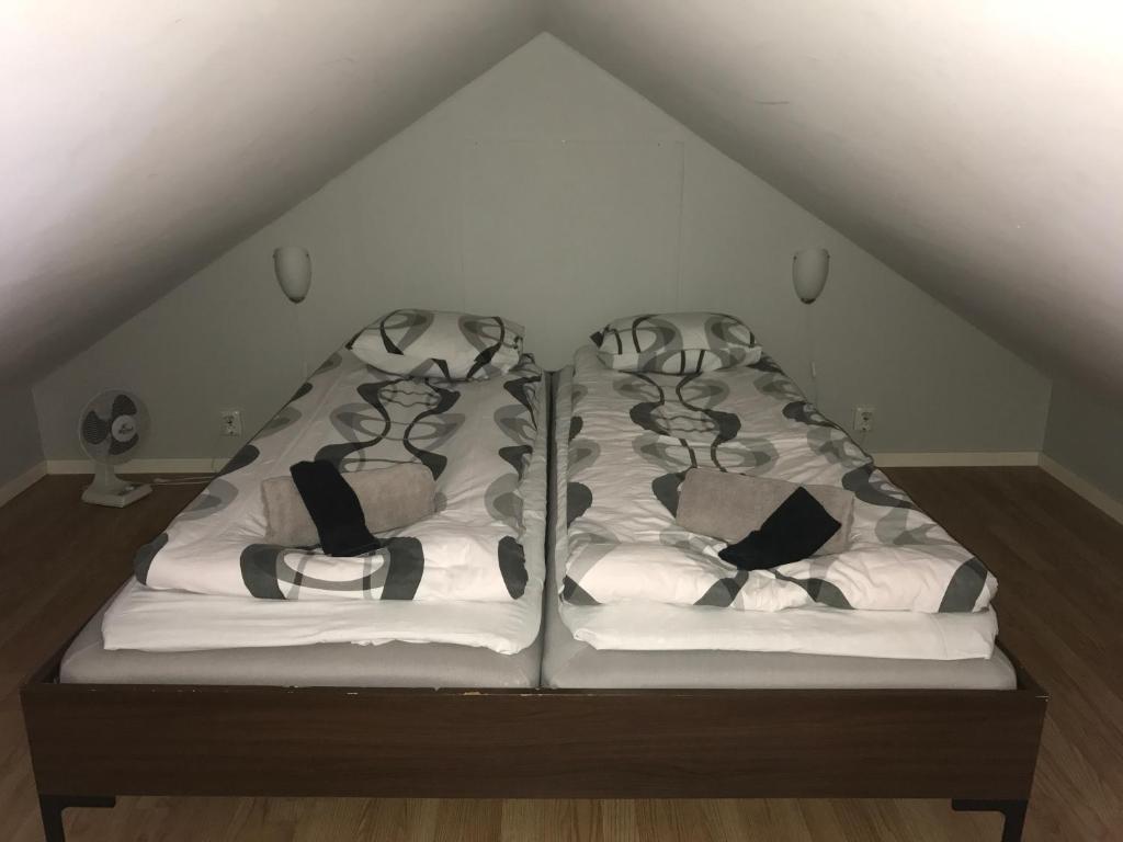 Postel nebo postele na pokoji v ubytování Hallandsgården by Mellbystrands