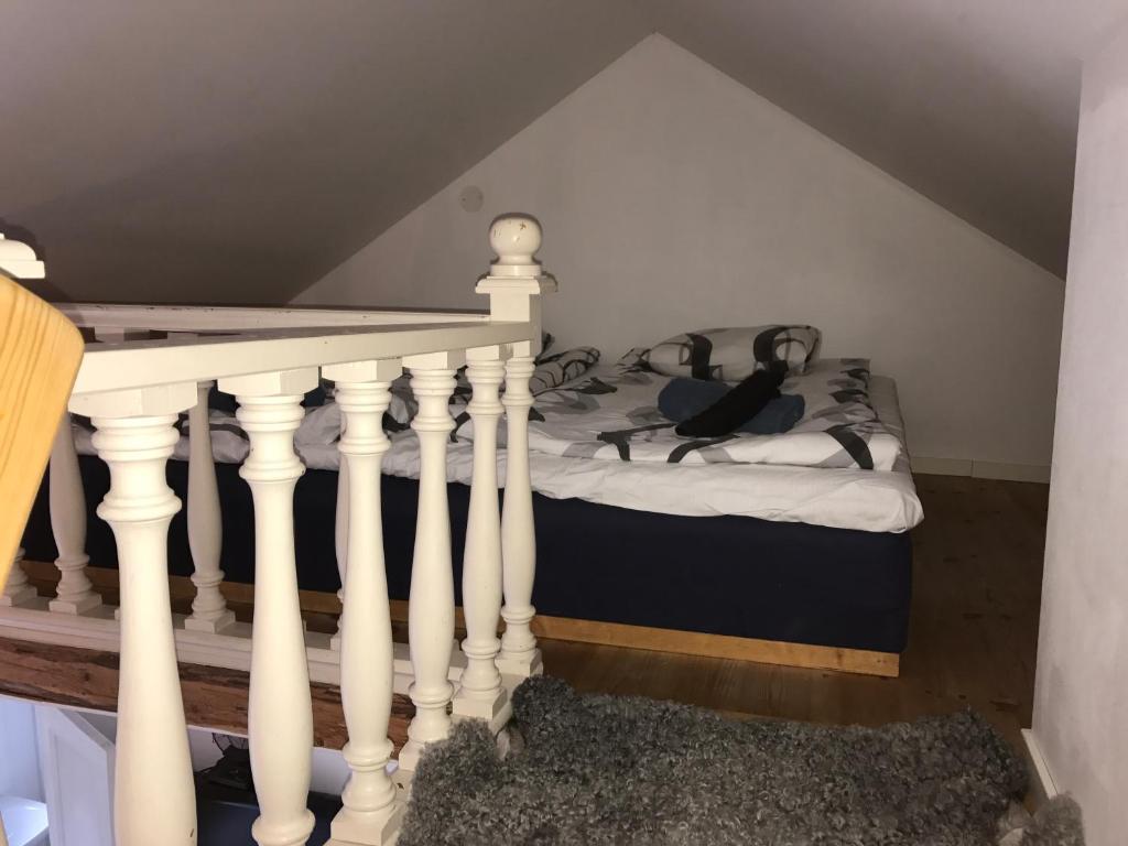 Postel nebo postele na pokoji v ubytování Hallandsgården by Mellbystrands
