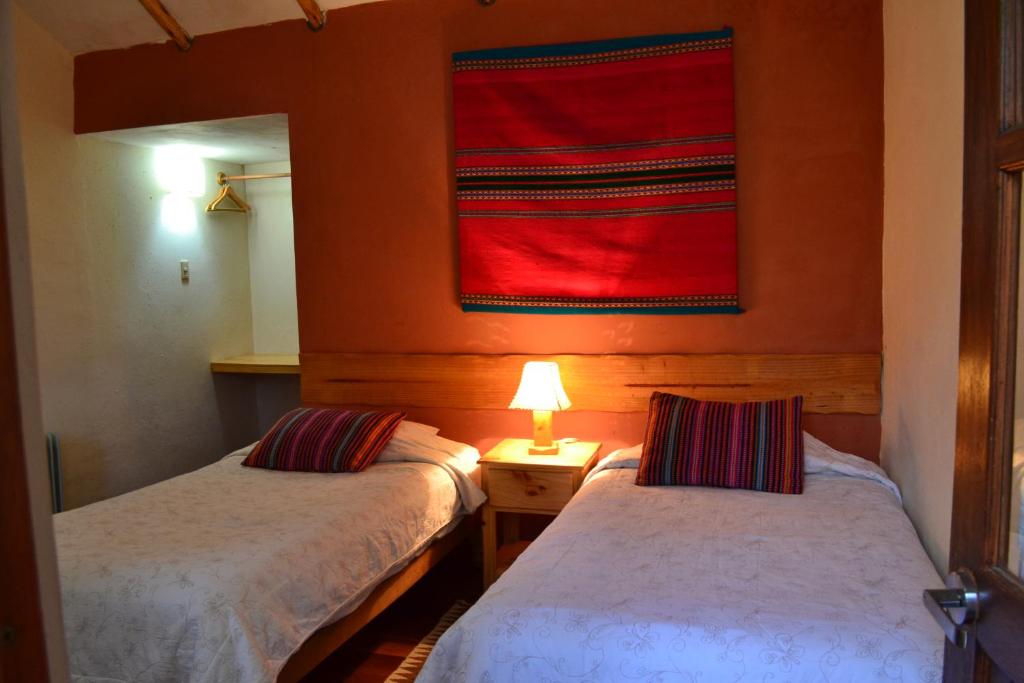 Postel nebo postele na pokoji v ubytování Miskiwasi Bed & Breakfast