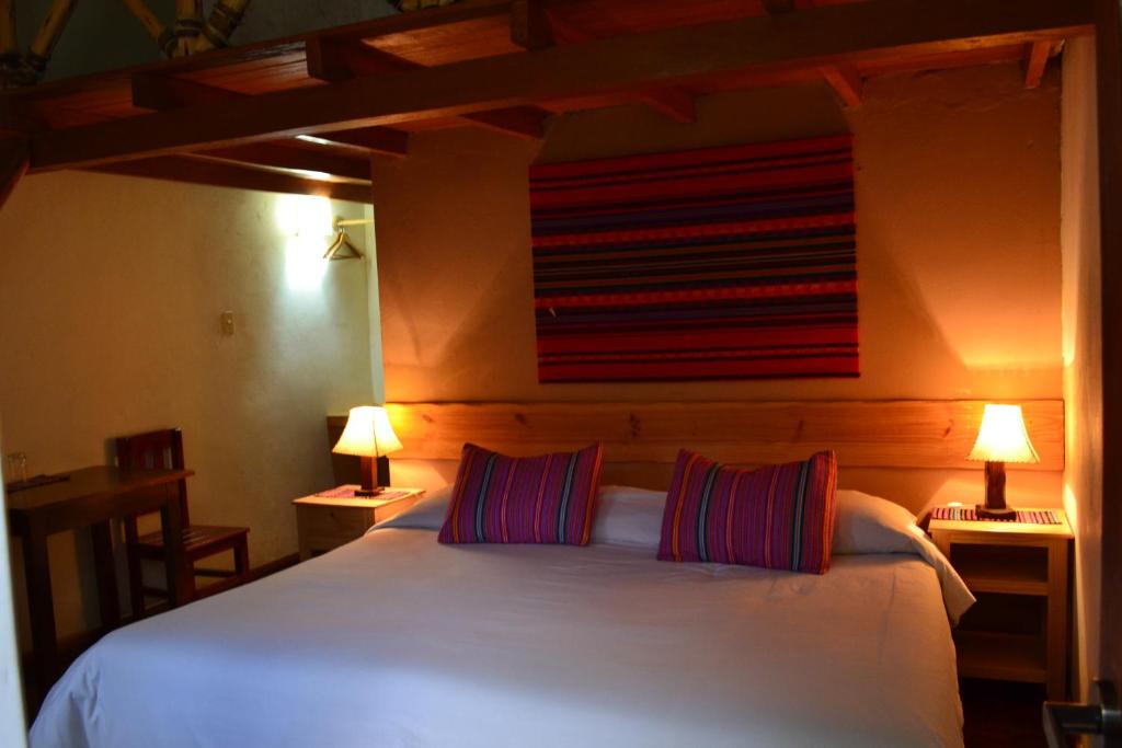 Postel nebo postele na pokoji v ubytování Miskiwasi Bed & Breakfast