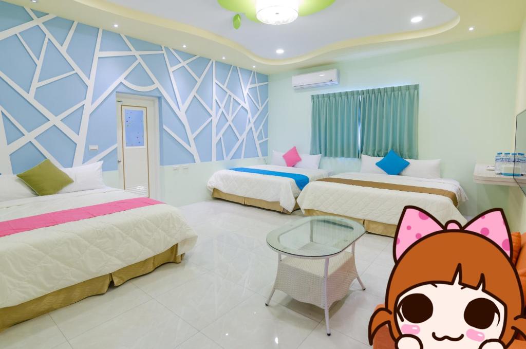 Postel nebo postele na pokoji v ubytování Mu Yu B&B