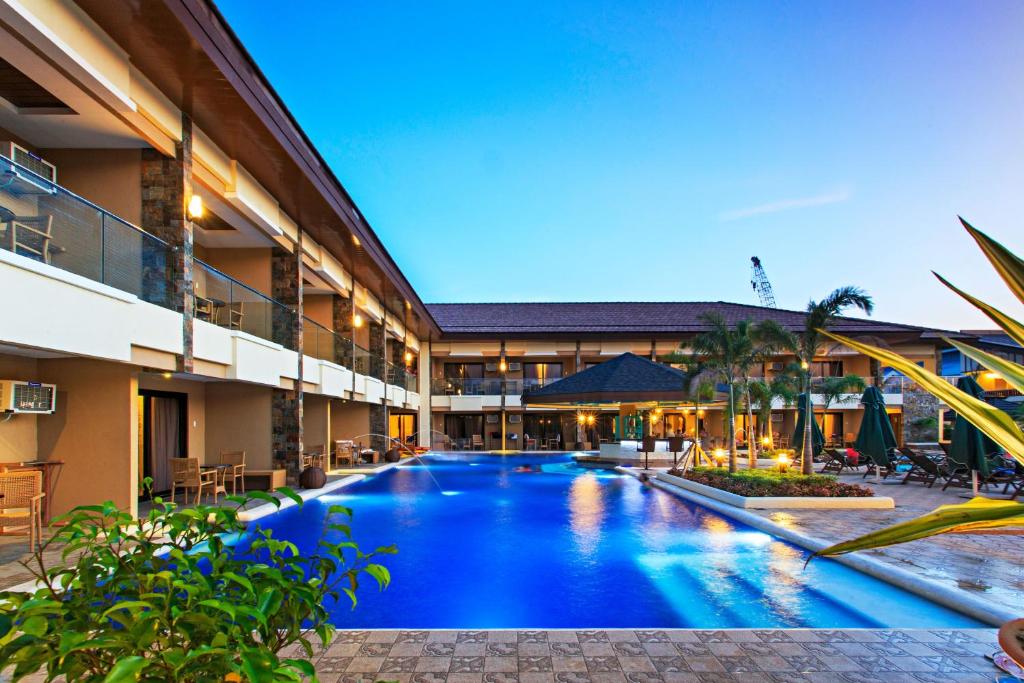 a swimming pool in the middle of a building at Cebu Westown Lagoon - South Wing in Cebu City