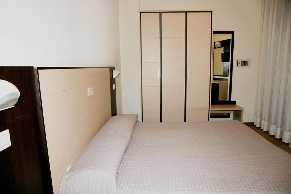 Postel nebo postele na pokoji v ubytování Hotel Daniel's FRONTE MARE