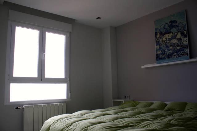 A bed or beds in a room at Cabo Mar Duplex