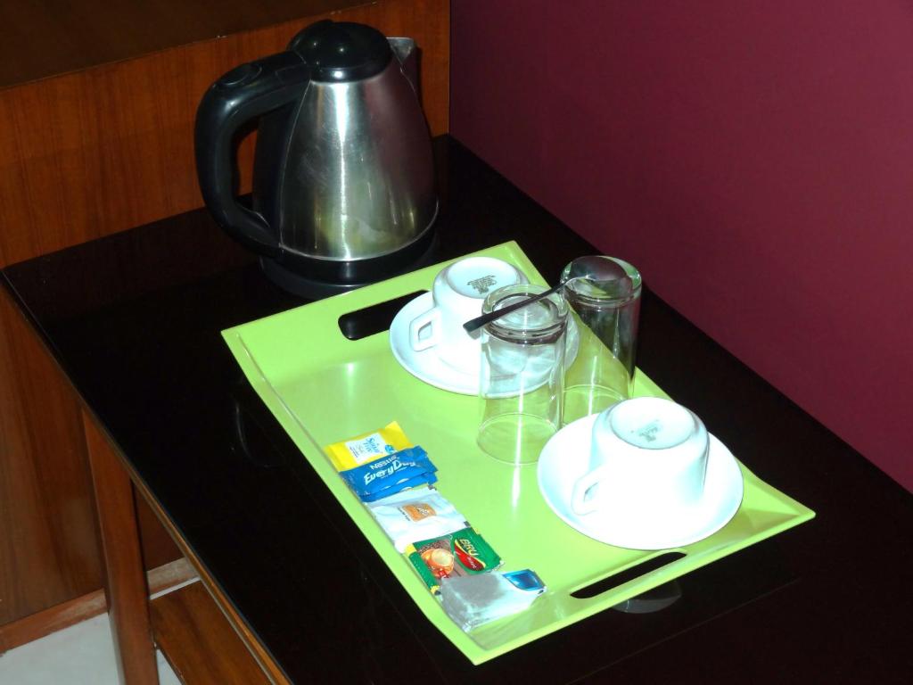 Příslušenství pro přípravu čaje a kávy v ubytování Hotel Gateway Continental