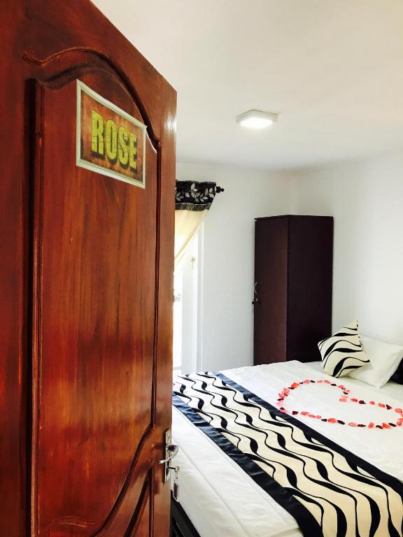 Voodi või voodid majutusasutuse Aerizo bungalow & Tours toas