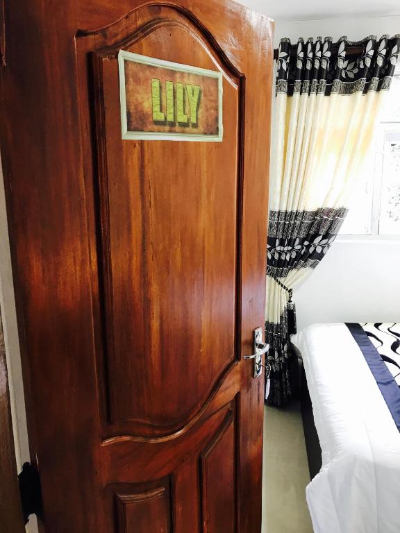 Voodi või voodid majutusasutuse Aerizo bungalow & Tours toas