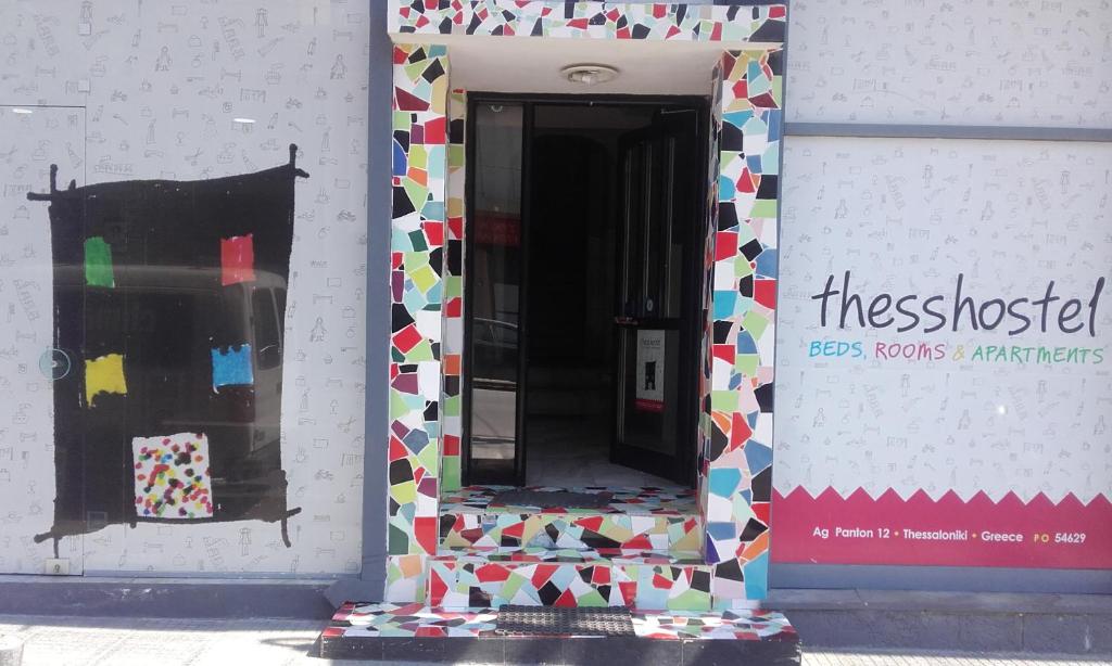 a front door of a building with colorful tiles at Thess Rooms Agion Panton 12 in Thessaloniki