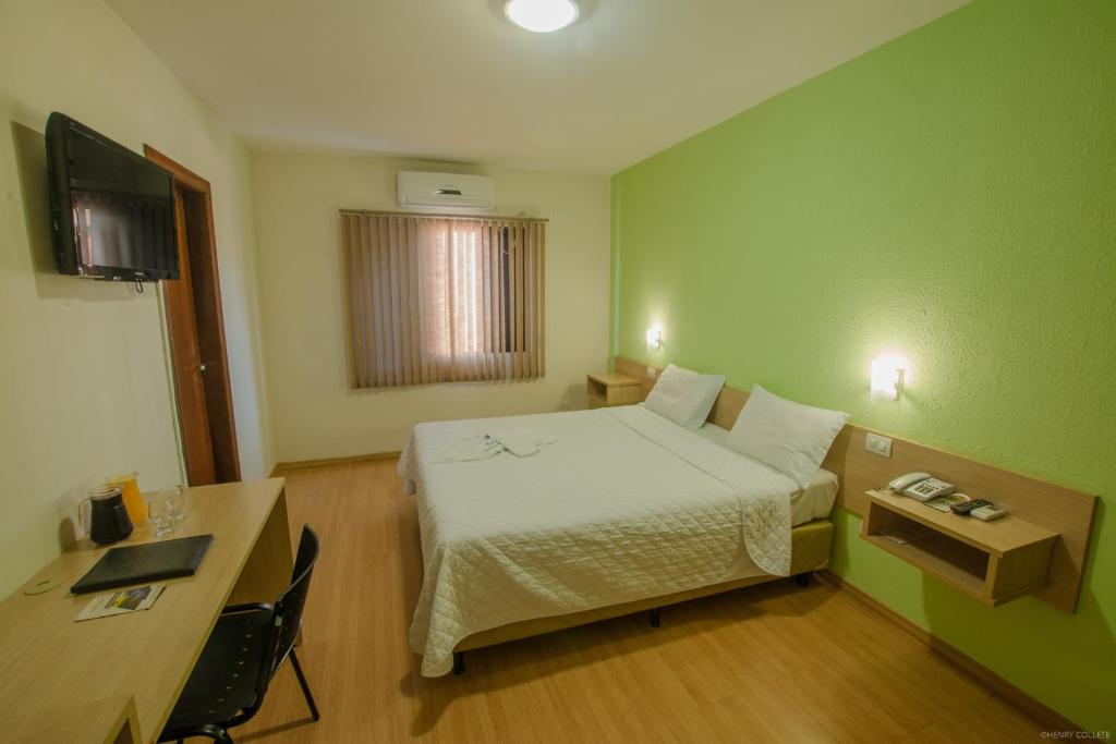 TV a/nebo společenská místnost v ubytování Hotel Dom Thomaz