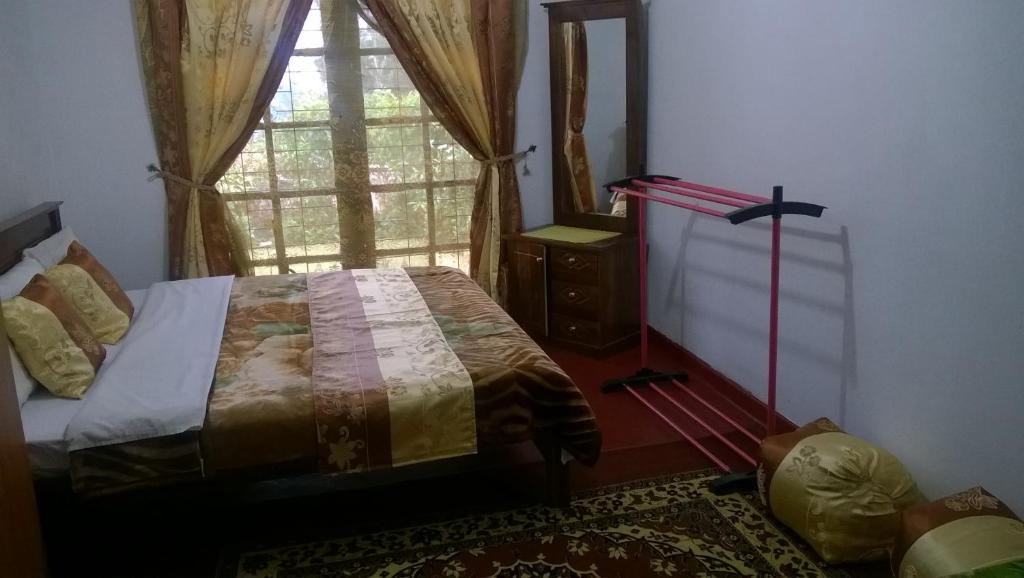 Postel nebo postele na pokoji v ubytování Srihelyes Inn