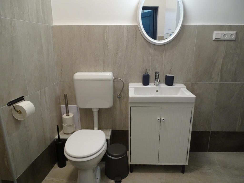 Kúpeľňa v ubytovaní Óváros Apartman