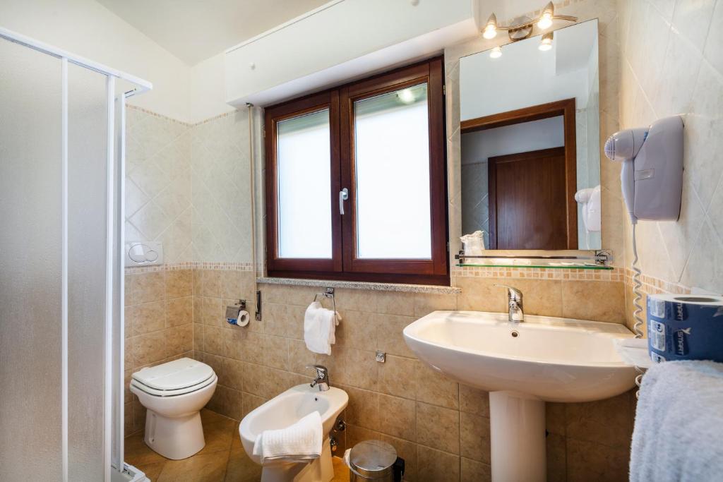 Koupelna v ubytování Hotel Petri Marini