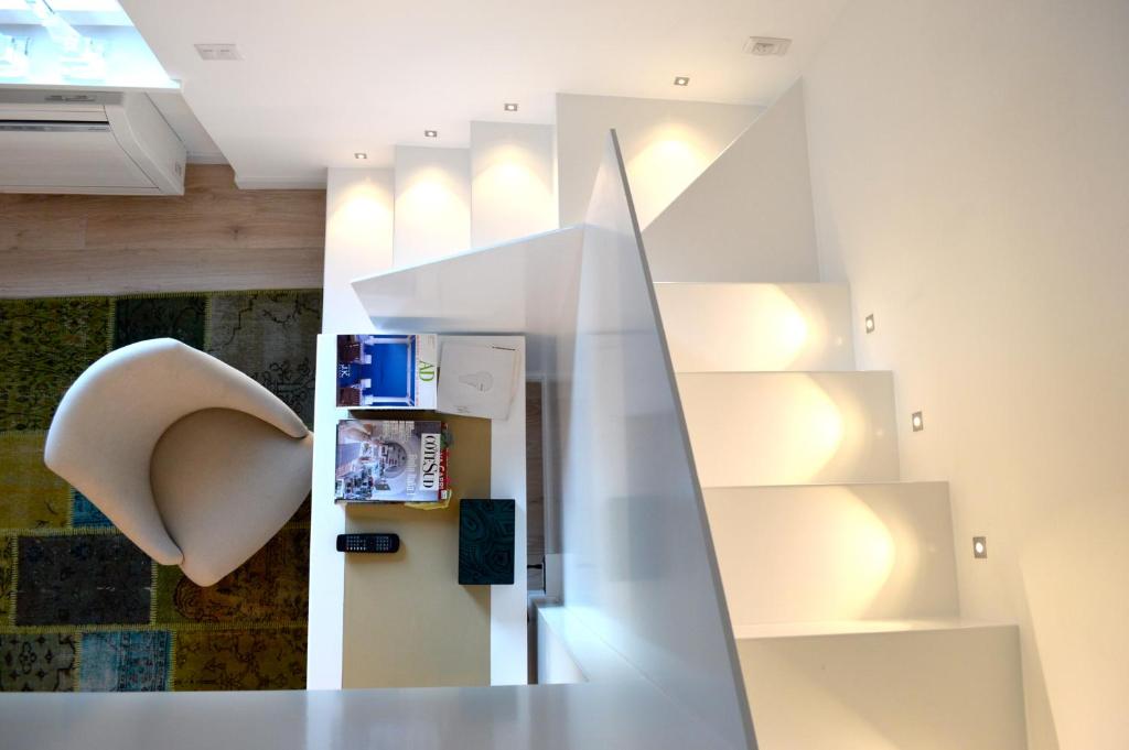 TV a/nebo společenská místnost v ubytování Casa Boutique by Capri 5 Senses