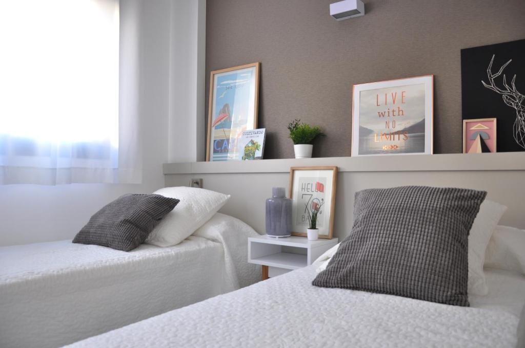 Postel nebo postele na pokoji v ubytování Residencia Universitaria Resa Tarragona Mediterrani