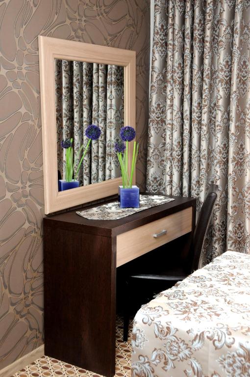 Postel nebo postele na pokoji v ubytování Hotel Lion