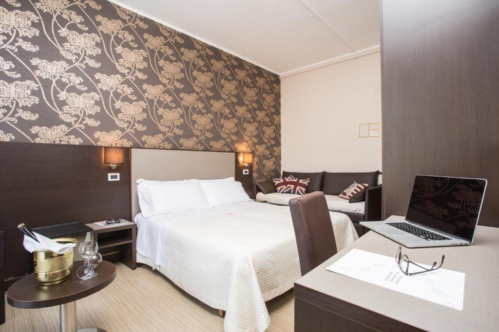 Postel nebo postele na pokoji v ubytování Hotel Lalla Beauty & Relax