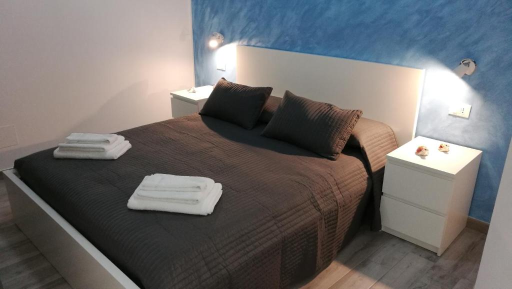 Postel nebo postele na pokoji v ubytování Perla del Sud - Guest House