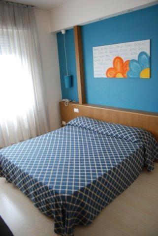 Postel nebo postele na pokoji v ubytování Cavalieri del Tau