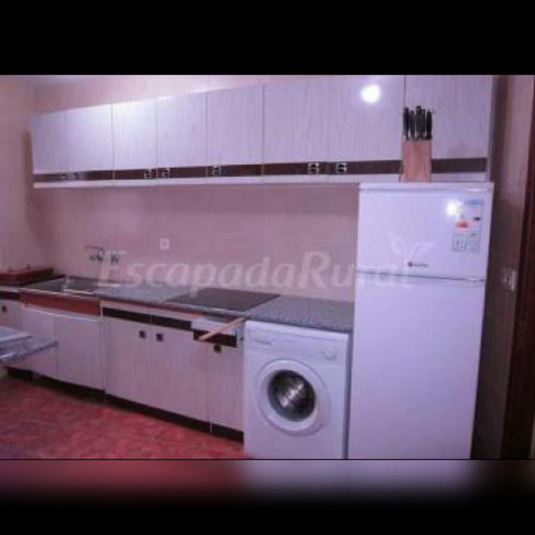 Kuchyň nebo kuchyňský kout v ubytování Villaespina