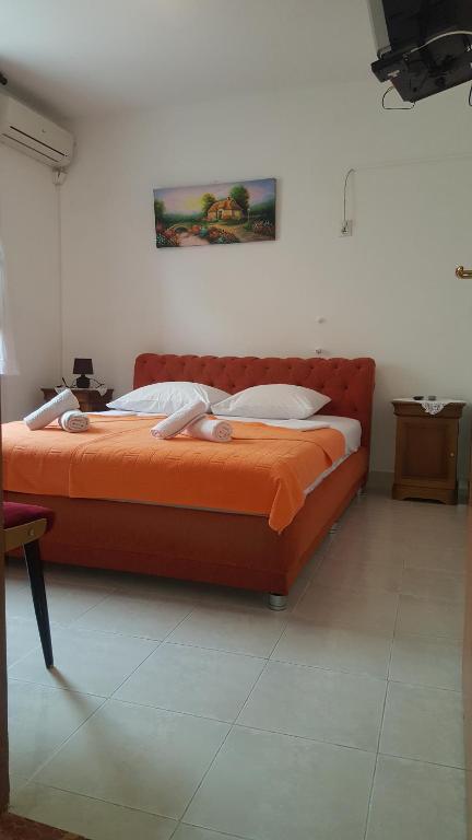 Postel nebo postele na pokoji v ubytování Guest House Ivo Jovanovic