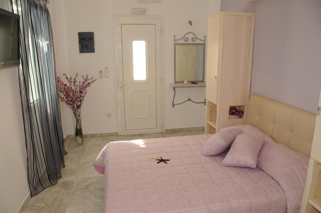Posteľ alebo postele v izbe v ubytovaní Starlight Luxury Studios