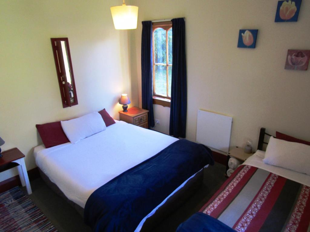 Postel nebo postele na pokoji v ubytování Greenstone Retreat