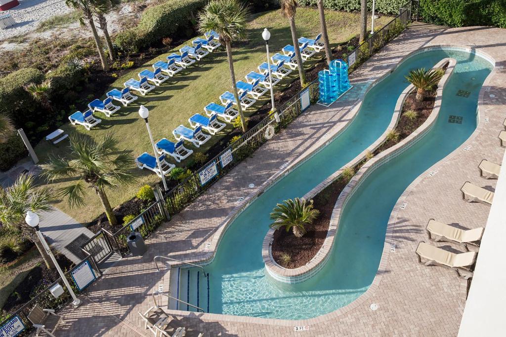 an overhead view of a swimming pool at a resort at Grande Shores in Myrtle Beach