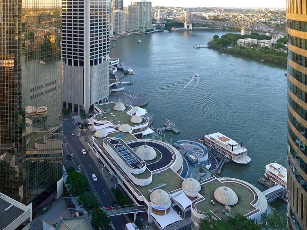 a view of a river in a city with buildings at Felix 374 FF Apartment in Brisbane