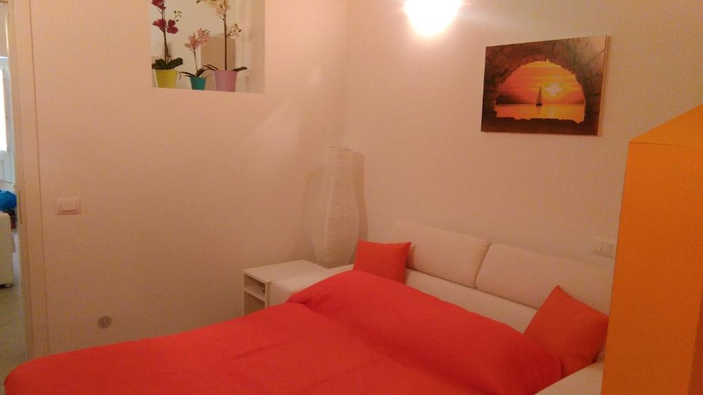 Łóżko lub łóżka w pokoju w obiekcie La Rosa dei Venti