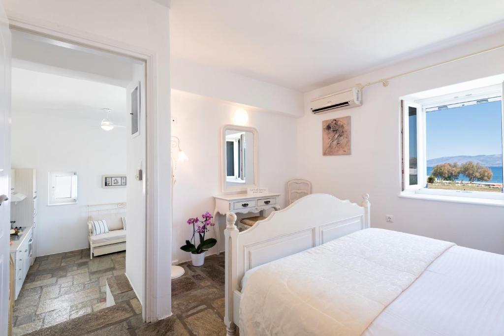 Postel nebo postele na pokoji v ubytování Ambelas Mare Apartments