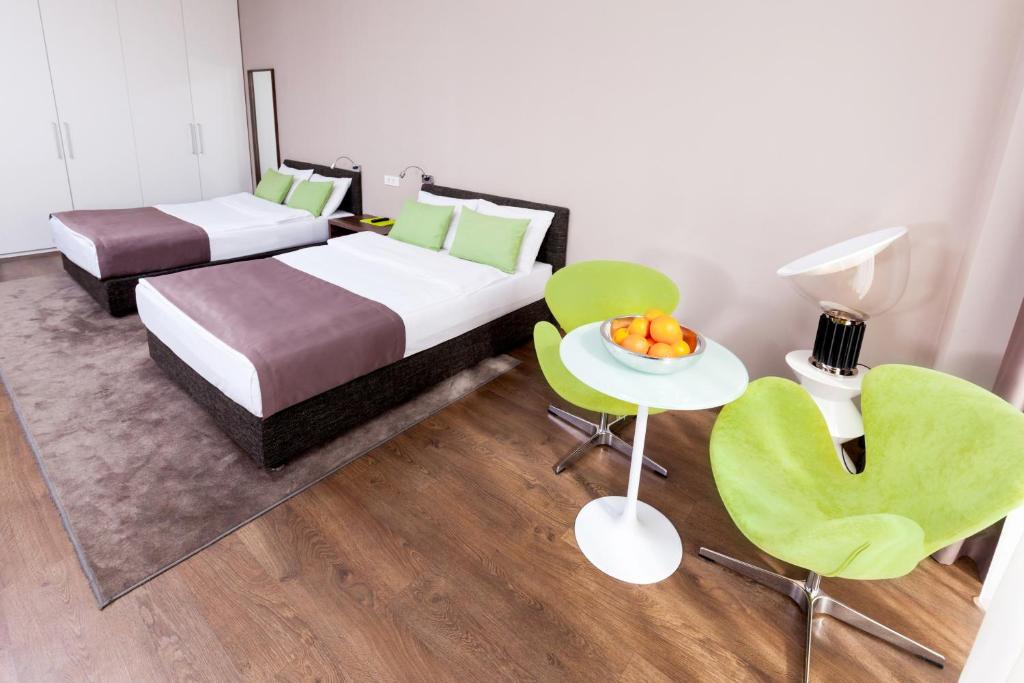 Voodi või voodid majutusasutuse Adresa Suites toas