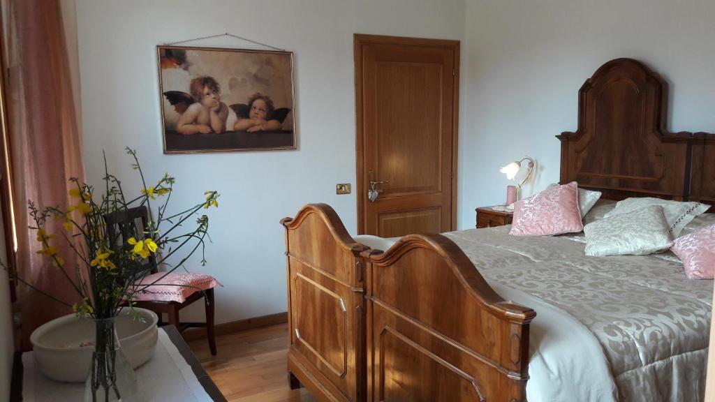 Postel nebo postele na pokoji v ubytování Bed and Breakfast Isabella
