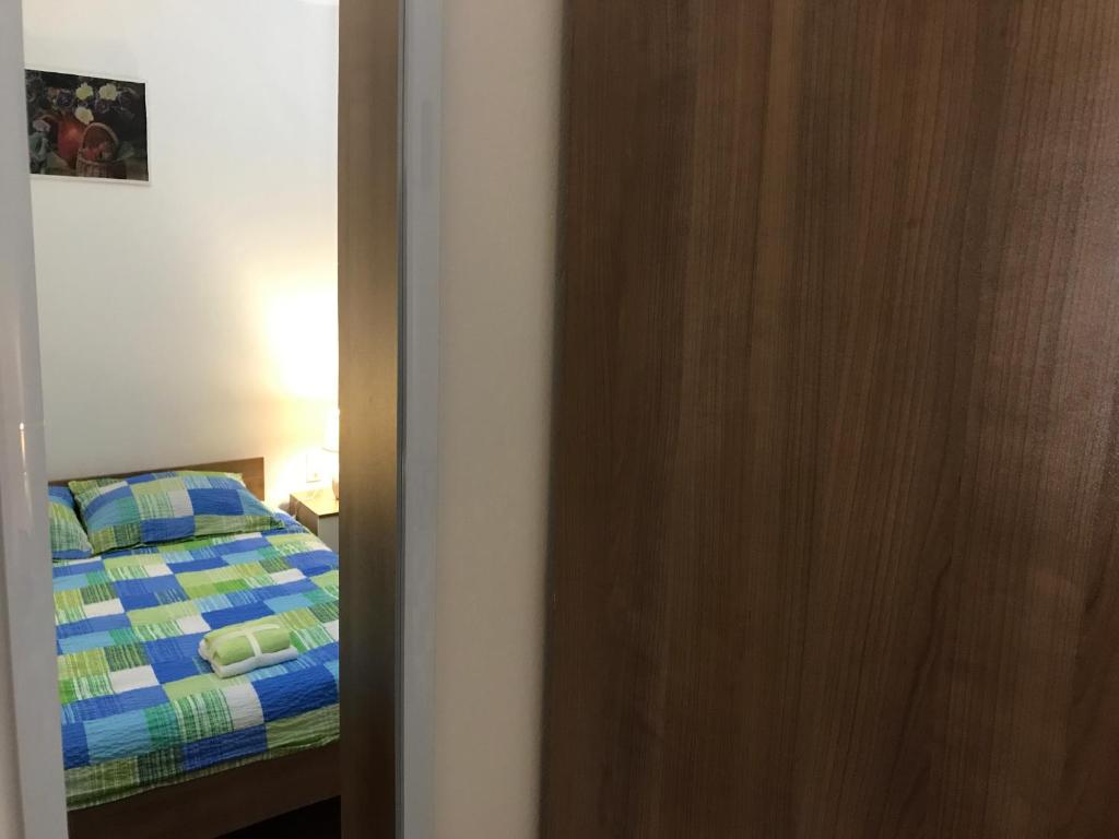 Posteľ alebo postele v izbe v ubytovaní Plitvice Diamond Apartment