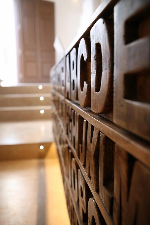 a close up of a wall of wood at Anagram Hotel in Mikonos