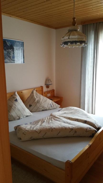 Postel nebo postele na pokoji v ubytování Appartement Grundner