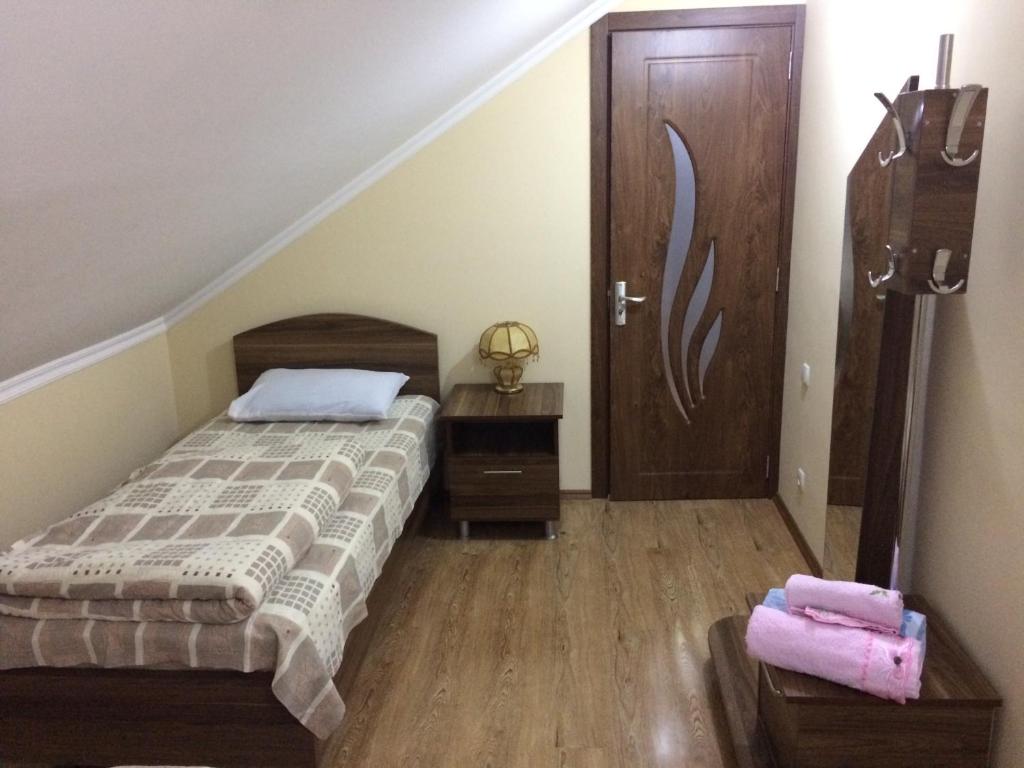 Postel nebo postele na pokoji v ubytování Mari Guest House