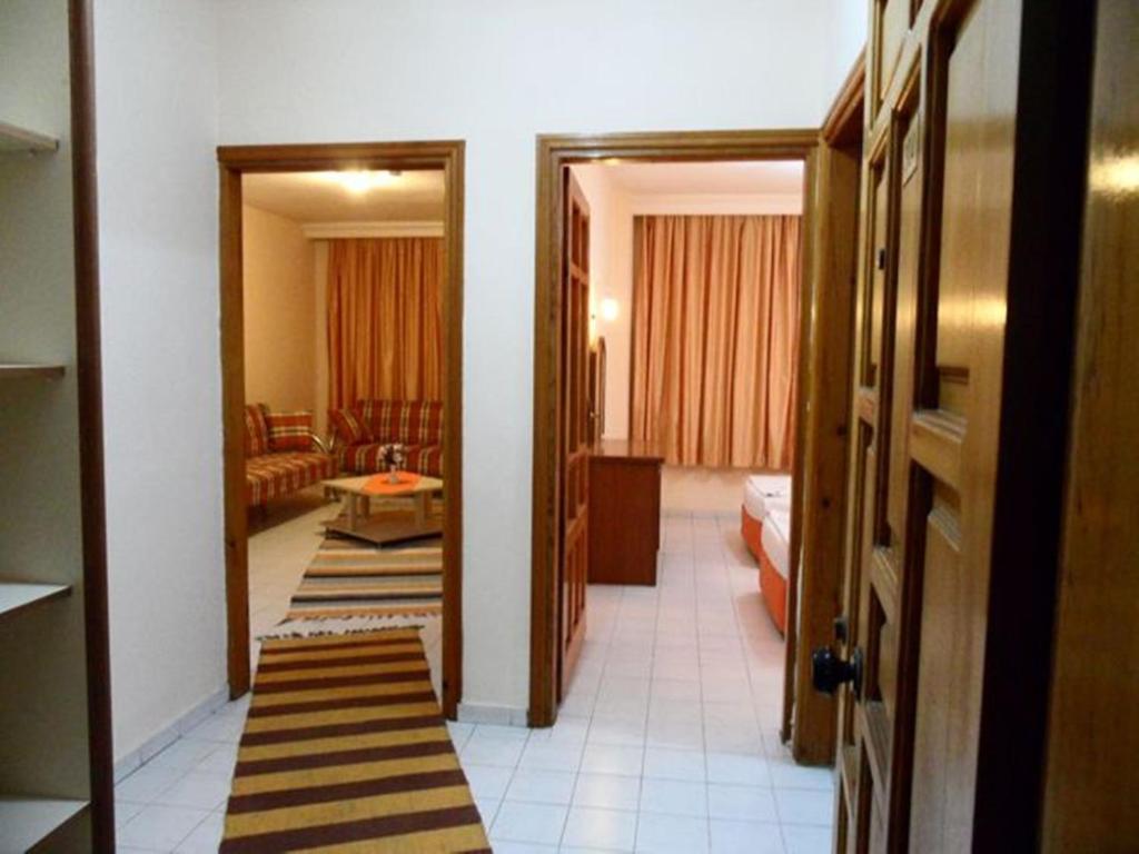 Postel nebo postele na pokoji v ubytování Baronessa Apart Hotel