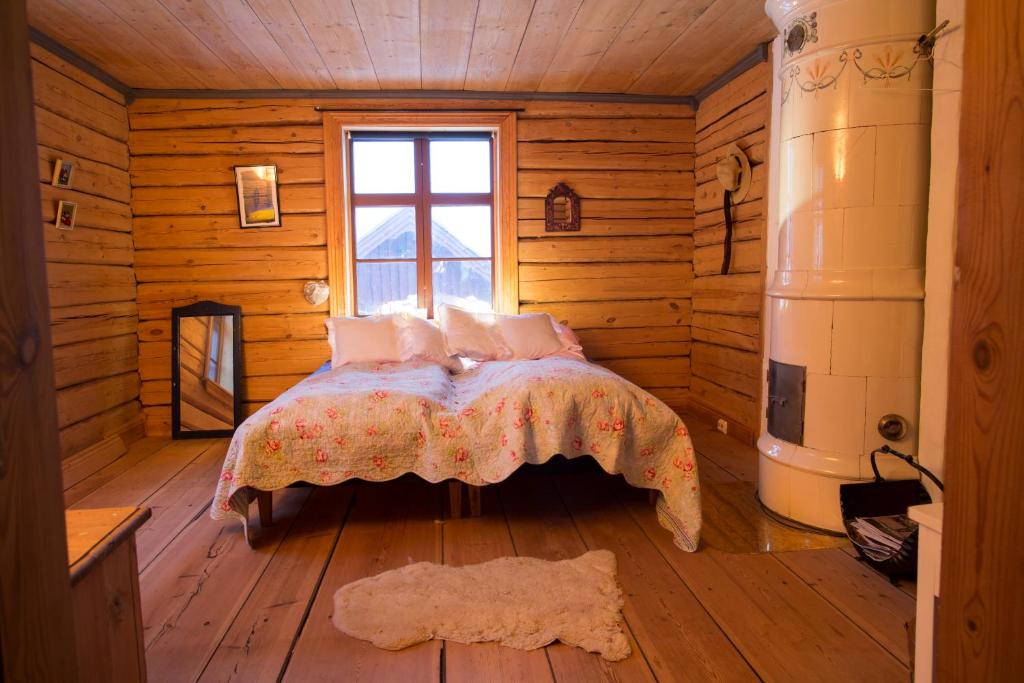 Postel nebo postele na pokoji v ubytování Stöpafors 110